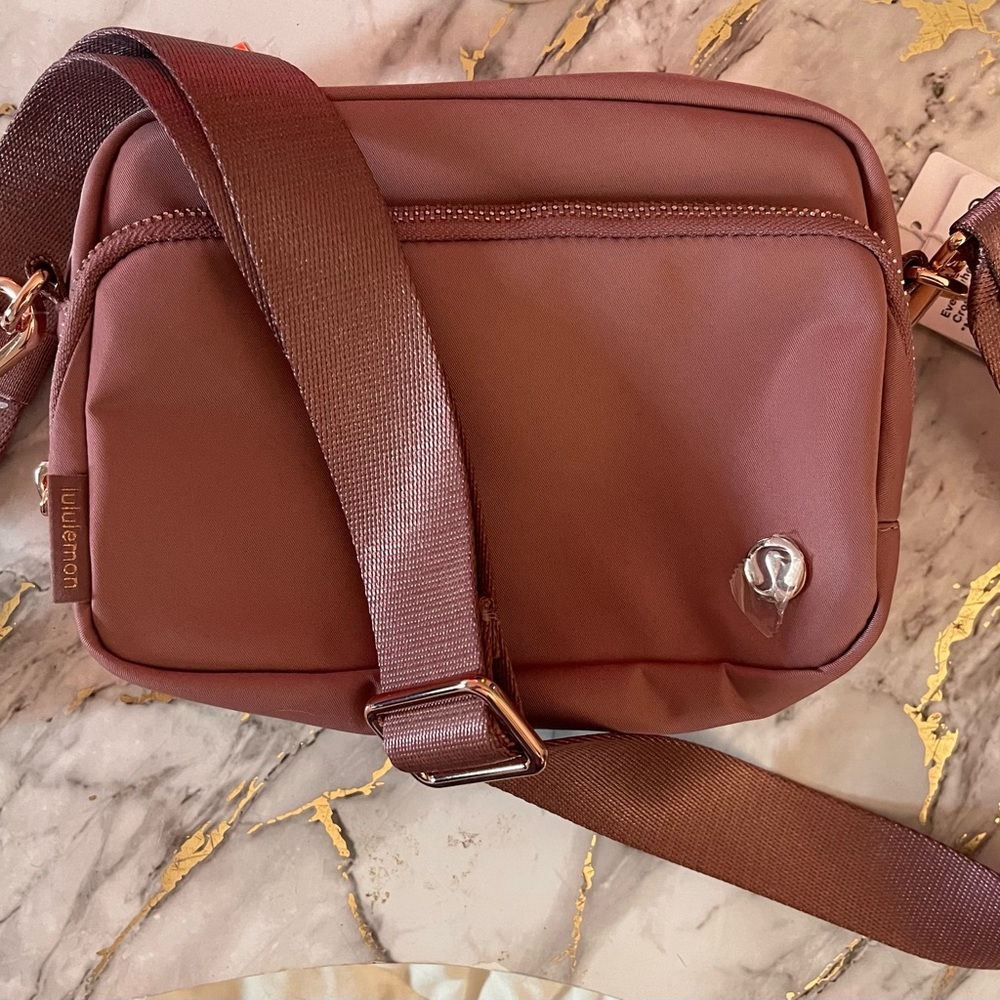 NWT lululemon dusty rose colored belt bag with rose-gold hardware
